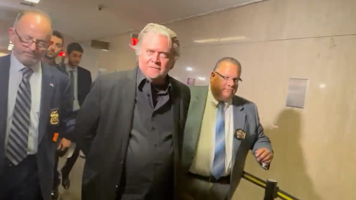 Viral Video Of A Ranting Steve Bannon Being Led Away In Handcuffs Has Twitter Applauding