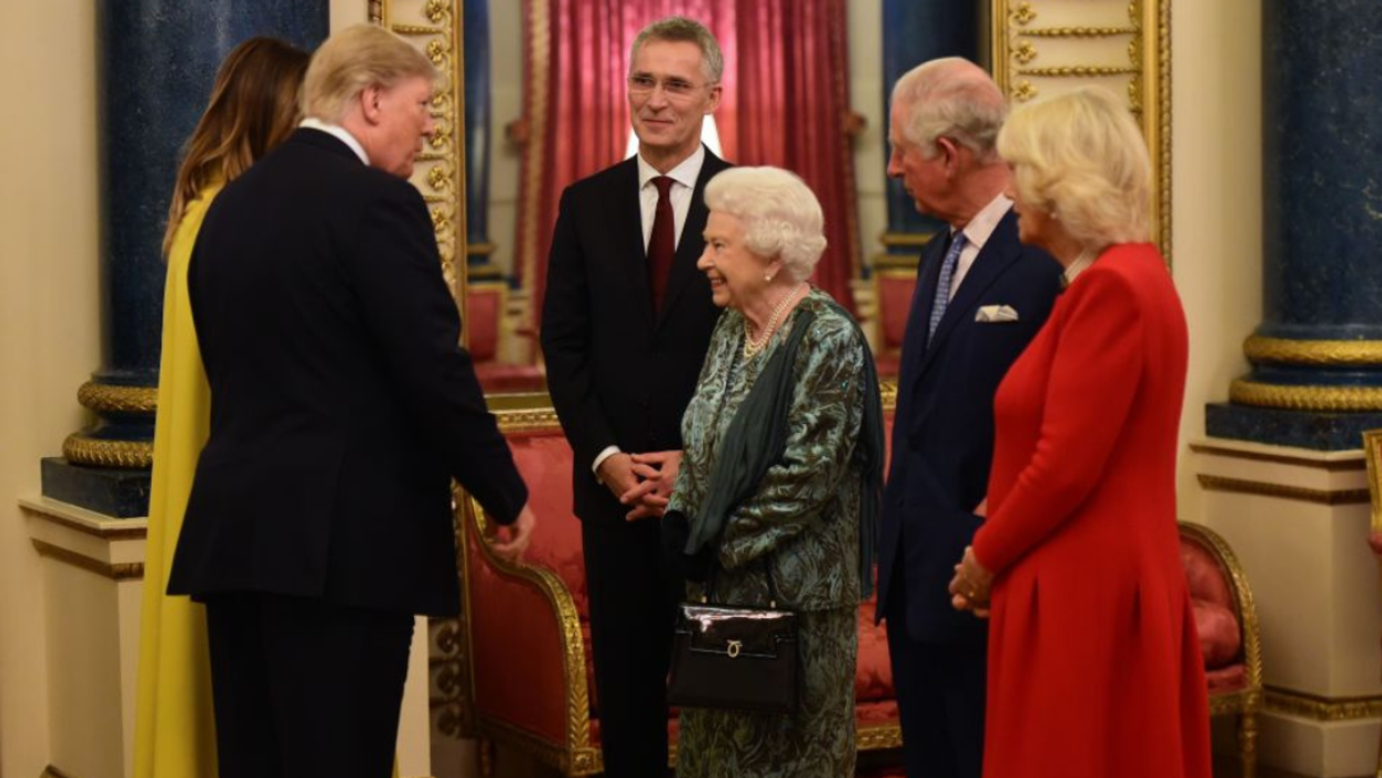 Resurfaced Video Appears To Show Charles Flipping Trump The Bird As He Meets The Queen