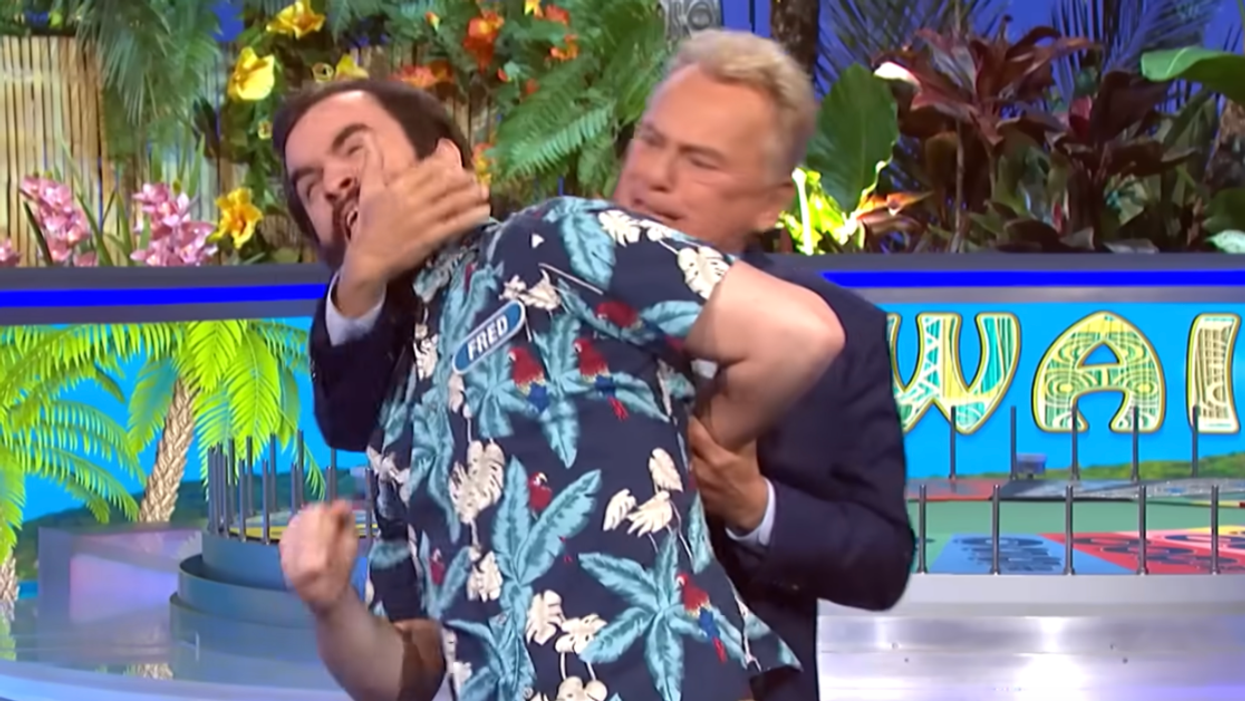 Pat Sajak 'Wrestles' With A Winning 'Wheel Of Fortune' Contestant In Hilariously Bizarre Moment