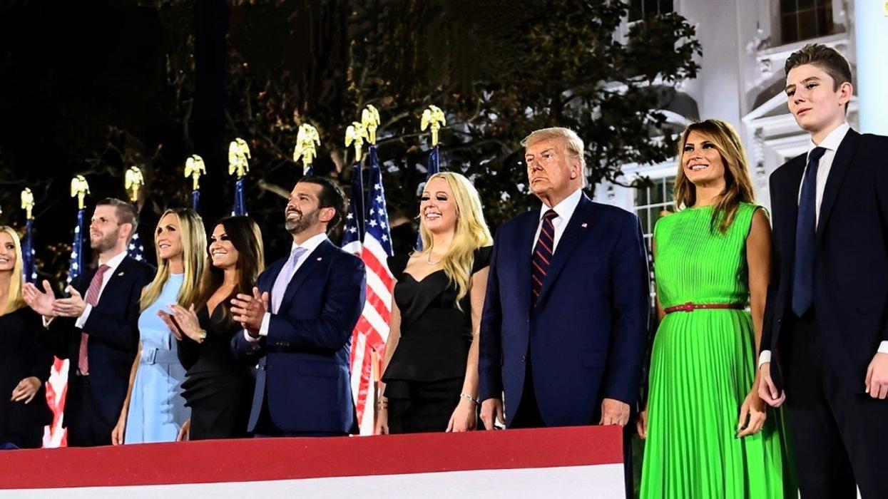 Ivanka, Eric, Laura, Don Jr., Tiffany, Donald, Melania, and Barron Trump with Kimberly Guilfoyle