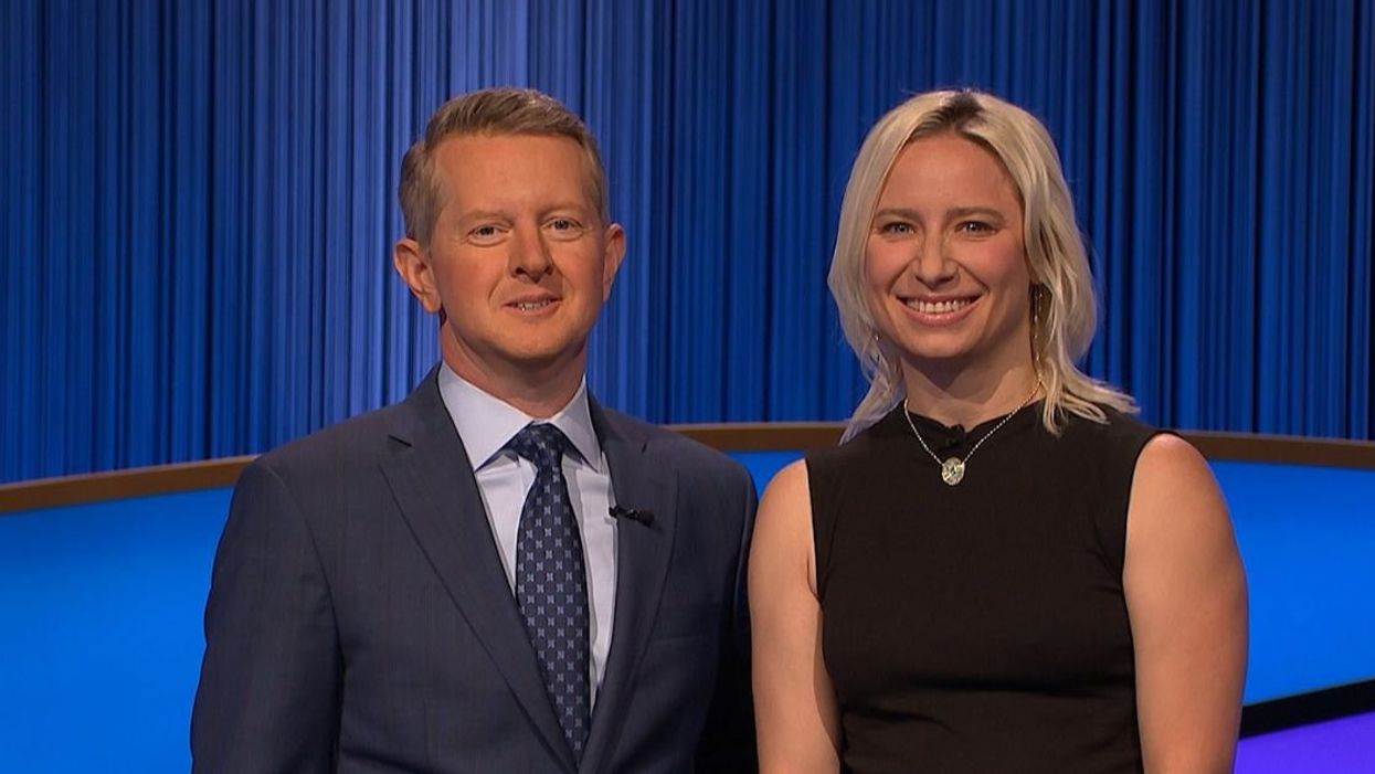 "Jeopardy!" host Ken Jennings with contestant Erin Buker