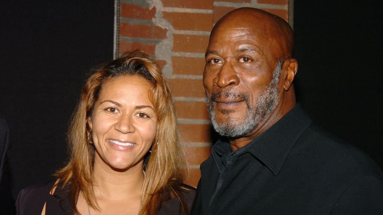 John Amos with daughter Shannon (left)