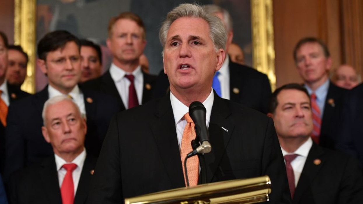 Kevin McCarthy surrounded by fellow Republicans