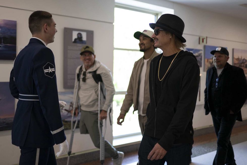 Kid Rock greeting people in Department of Veteran Affairs