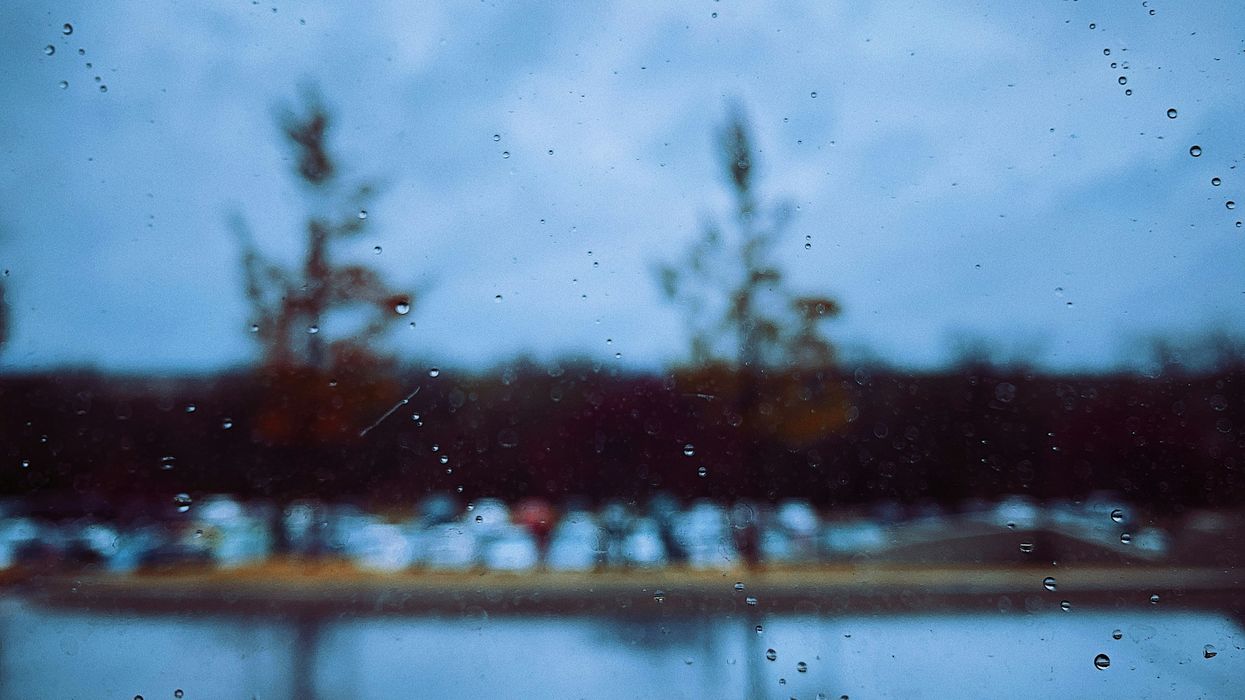 lake through window during rain