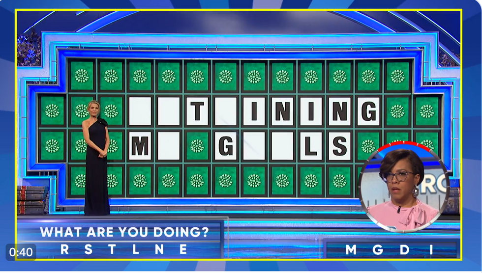 Laryn Nelson attempting to guess the bonus round puzzle