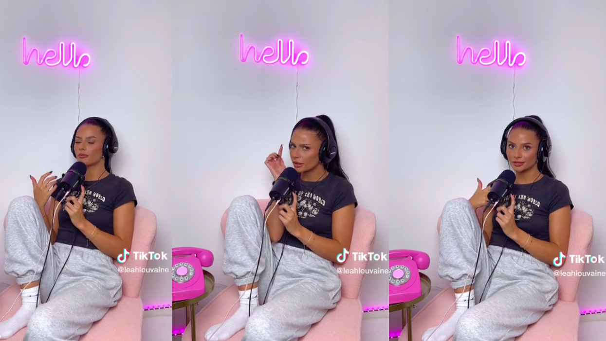 Leah Louvaine sitting in a chair with headphones and a microphone