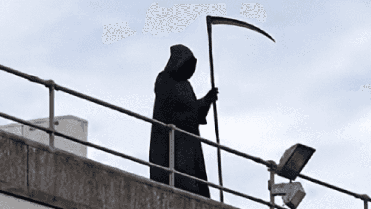 Leon Gillespie as the Grim Reaper