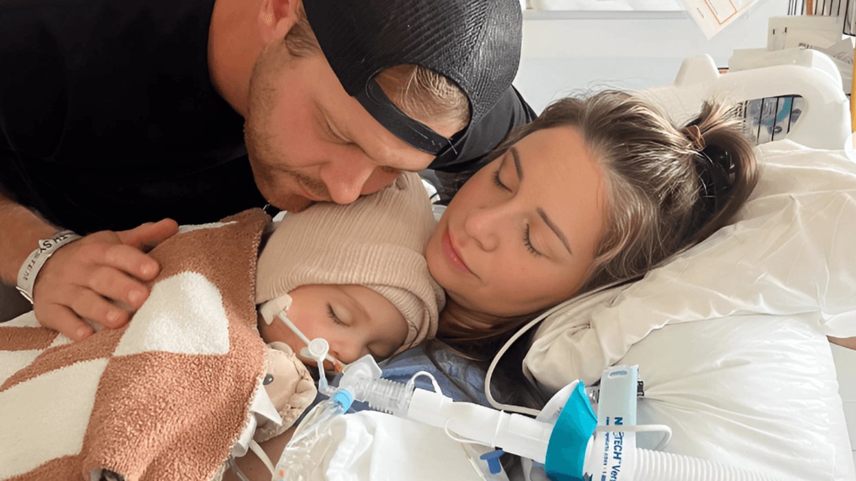 Lindsay and Eric Dewey with their late son, Reed