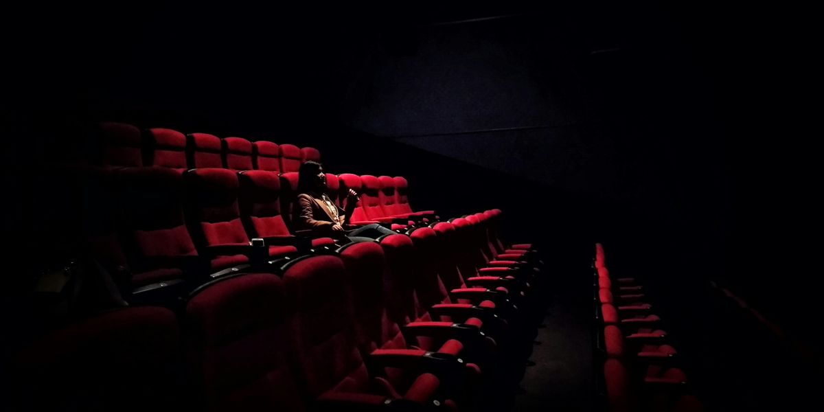 Lone moviegoer inside a theaeter