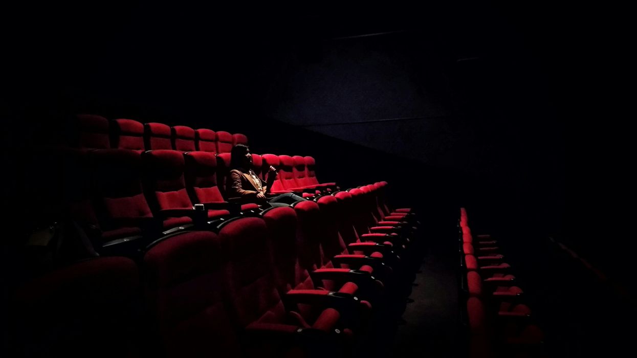 Lone moviegoer inside a theaeter