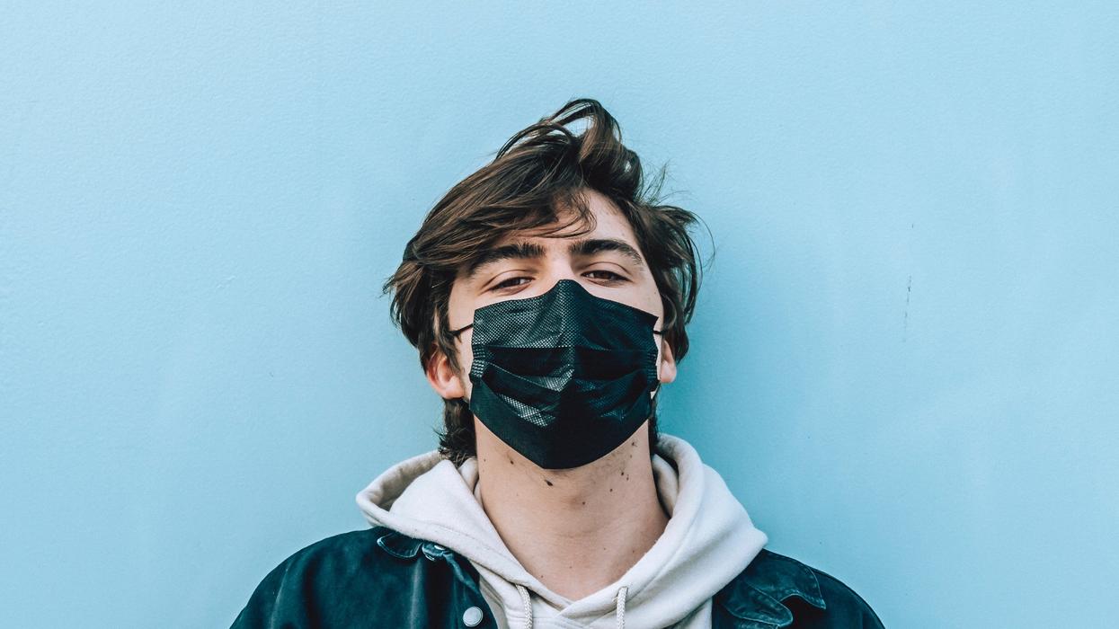 Male patient wearing medical mask