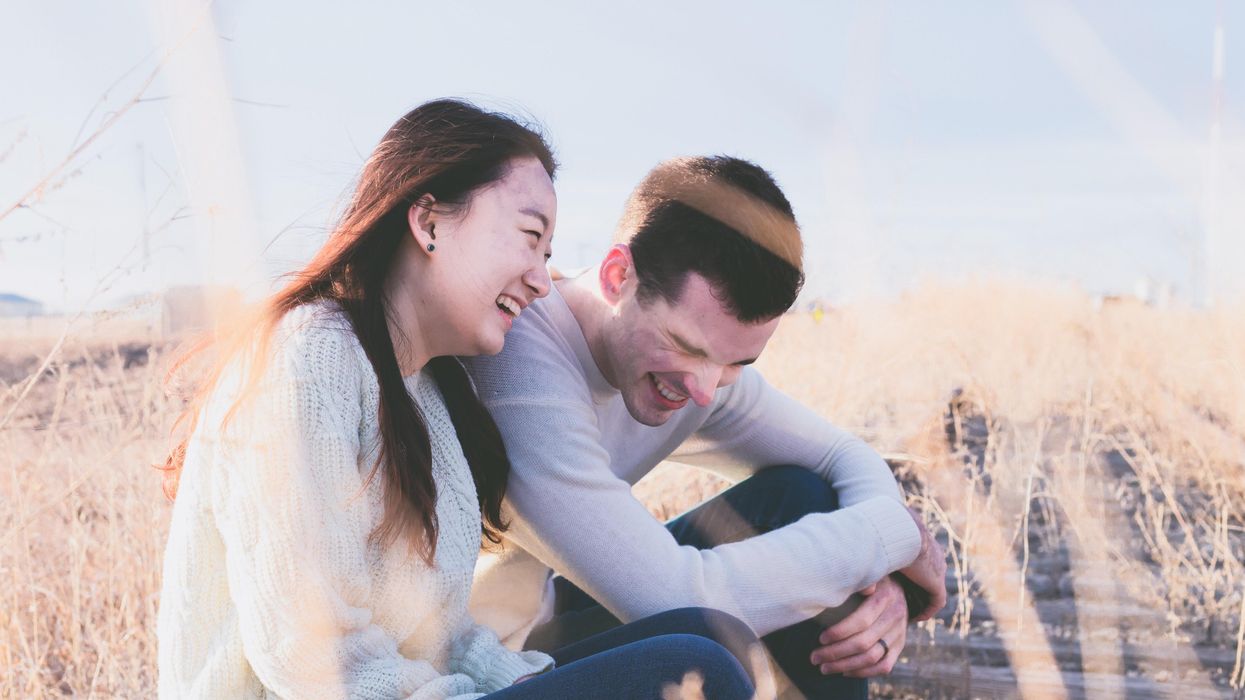 Man and woman laughing
