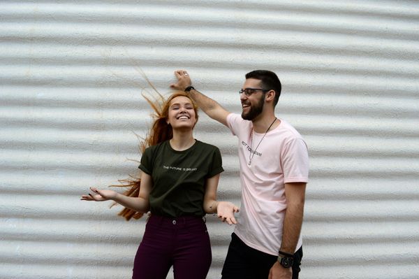 Man and woman laughing