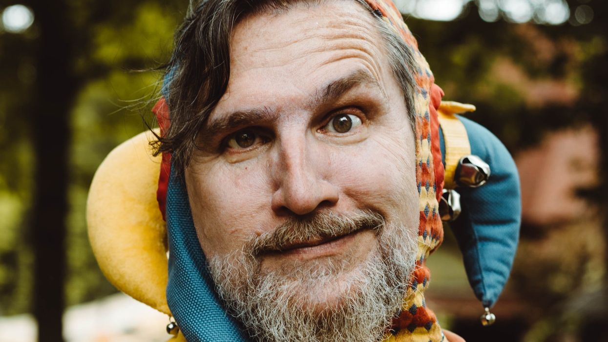 Man dressed a court jester or a joker