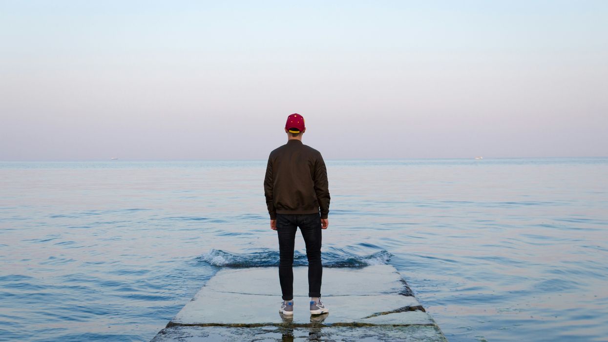Man looking out into the ocean