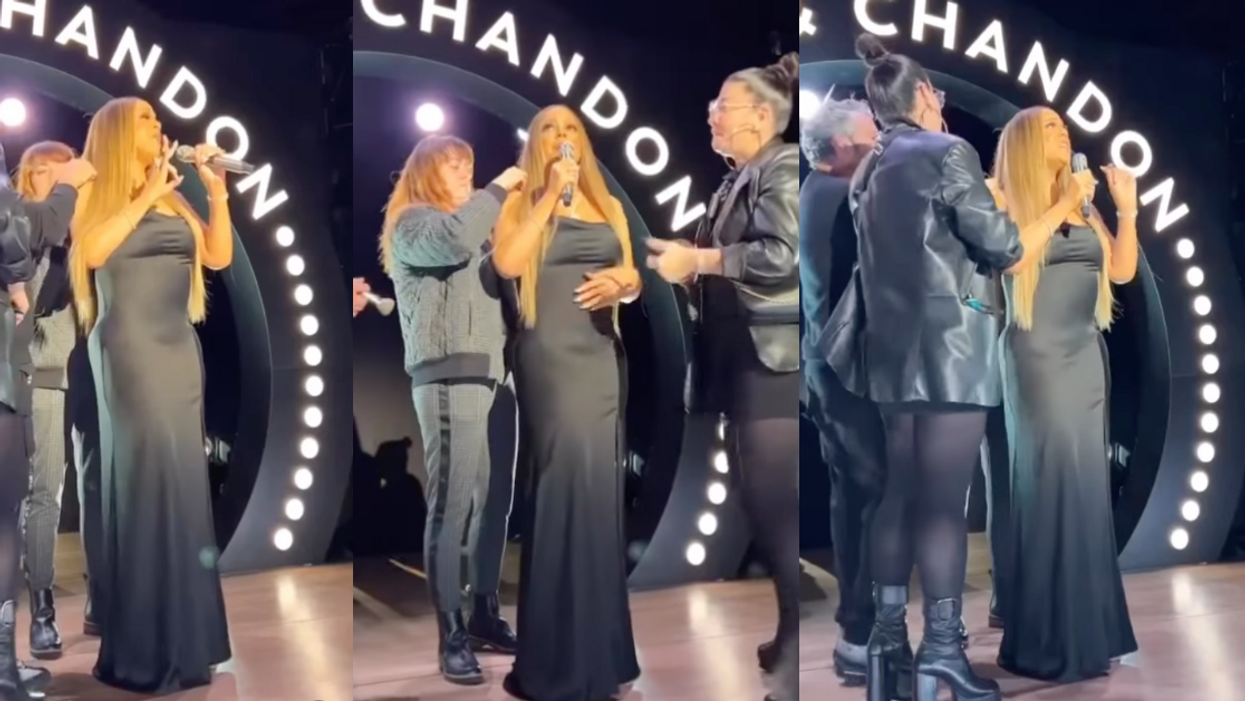 Mariah Carey with team on stage