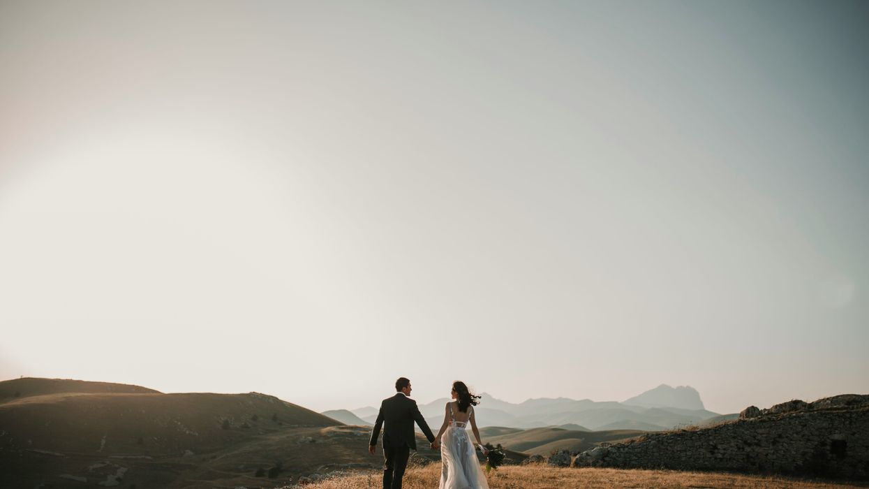 Married couple in a mountainous field