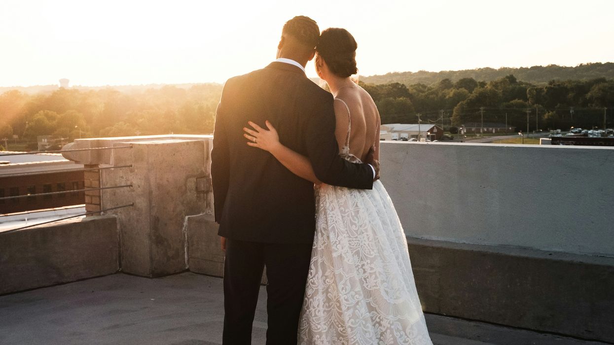 Married couple viewing a sunset