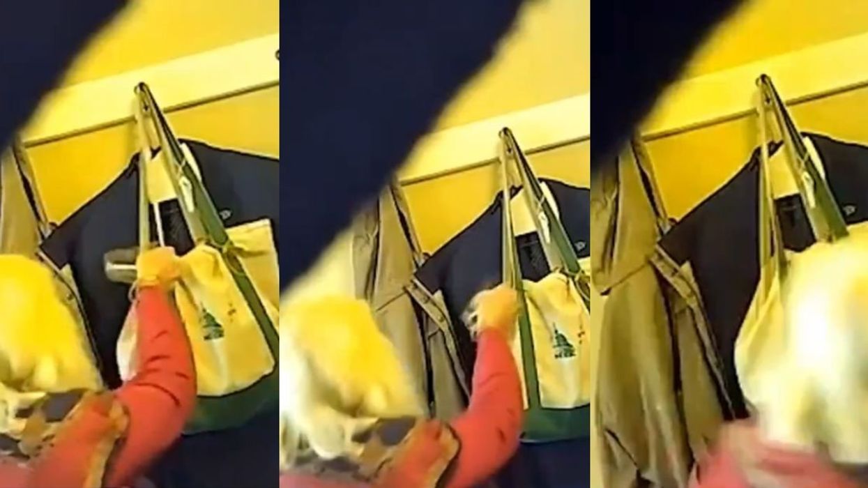 Mary Morrissey caught on camera pouring water into Jim Carroll's tote bag.