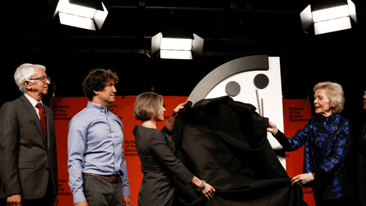 Members of the Bulletin of the Atomic Scientists unveil their Doomsday Clock