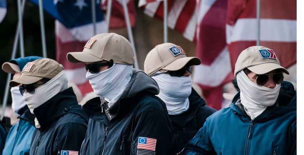 Gay Man Speaks Out After Chilling Photo Captured Him Surrounded By White Nationalists