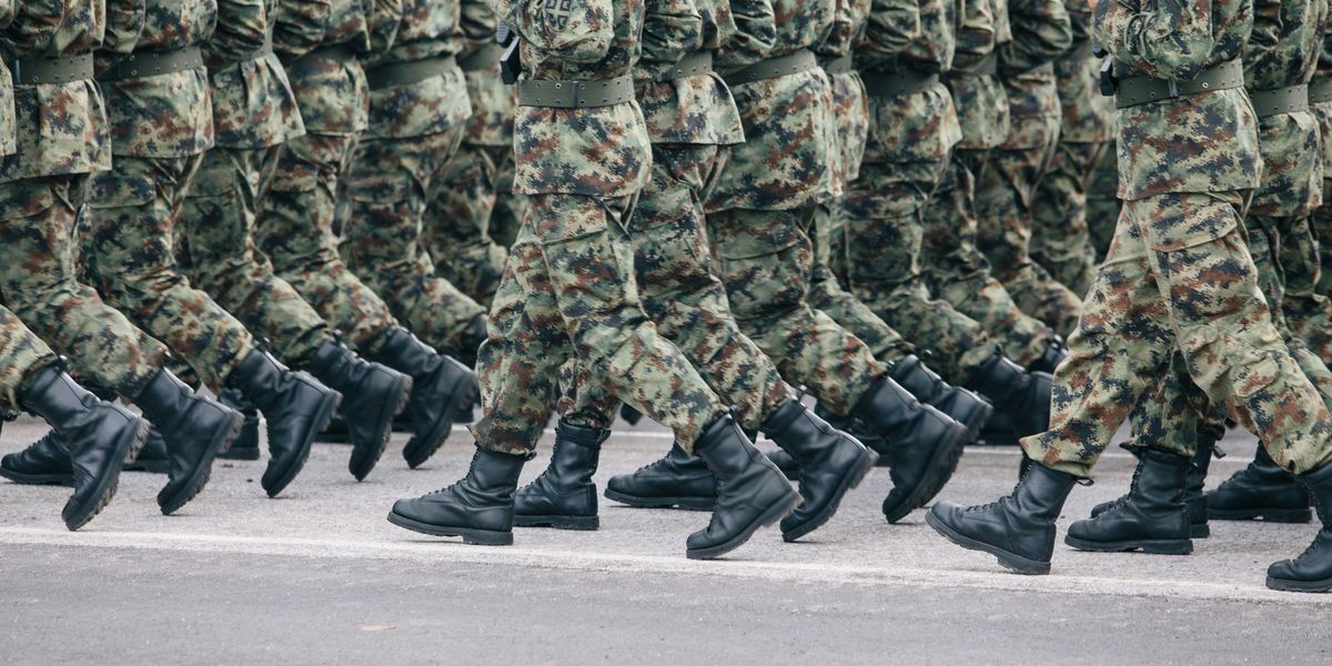 Men in uniform, running in formation