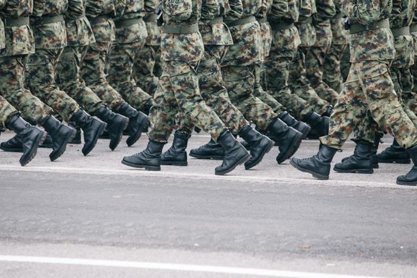 Men in uniform, running in formation
