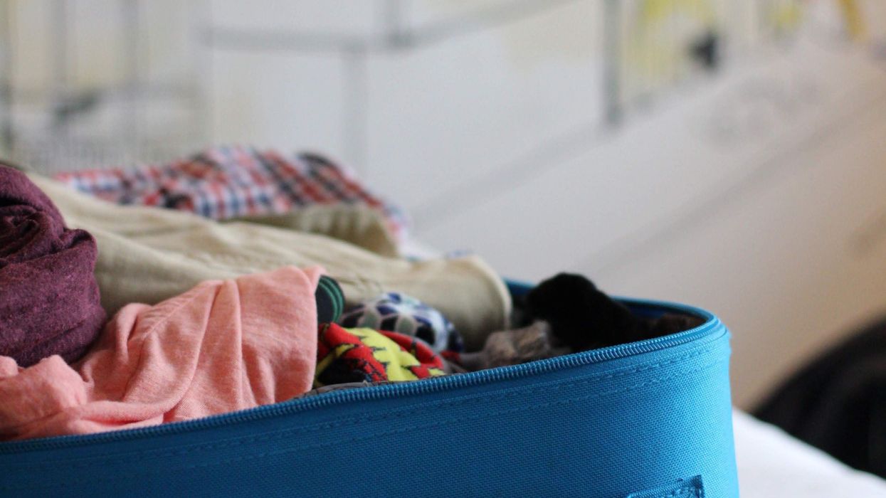 Messily packed suitcase