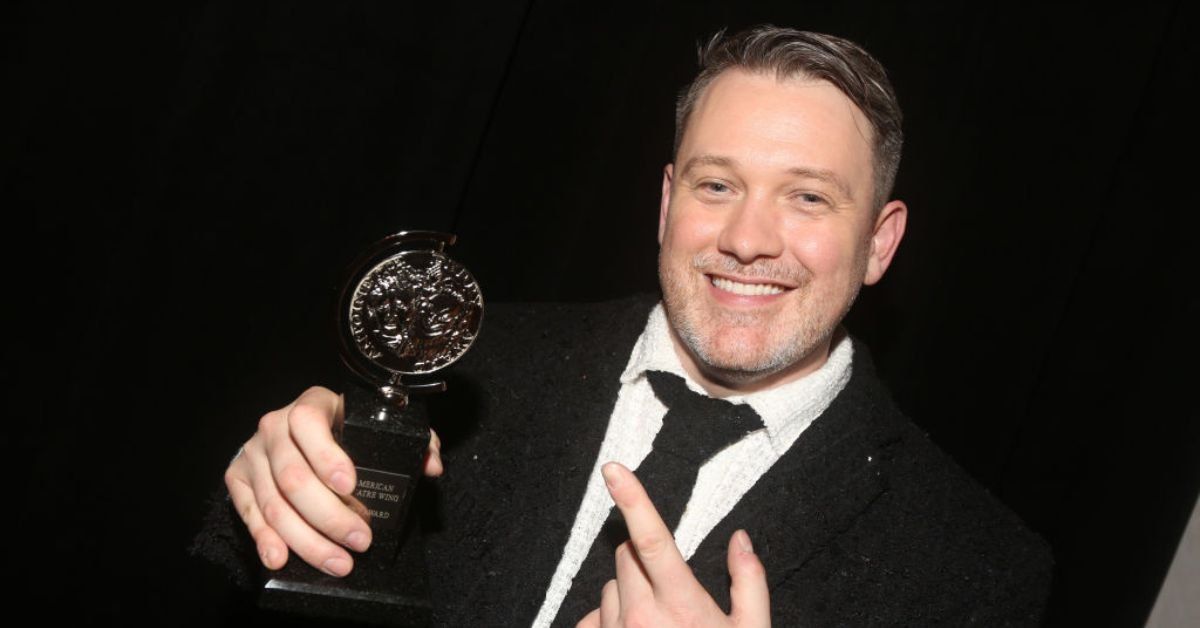 Michael Arden with his Tony Award