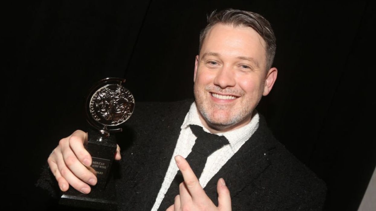 Michael Arden with his Tony Award