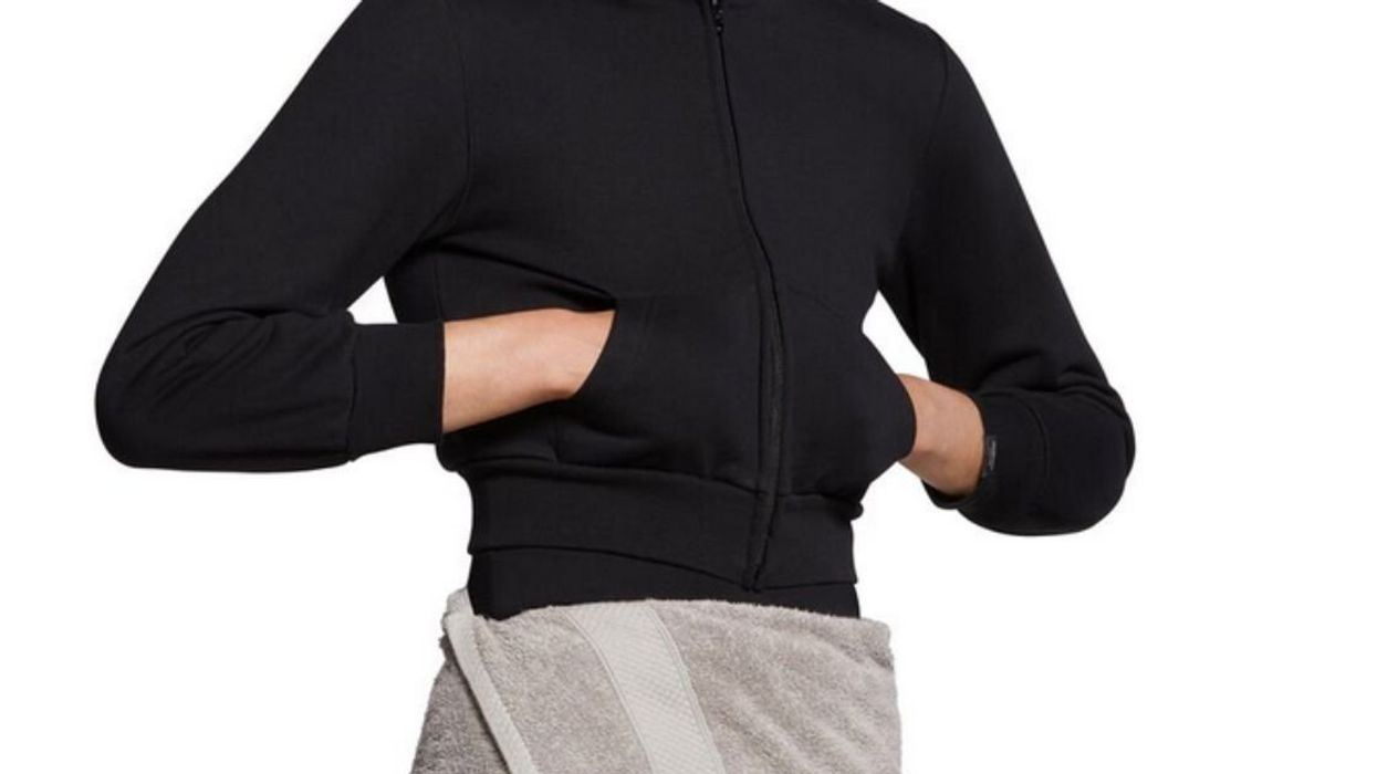 Model wearing Balenciaga's wrap-around towel skirt