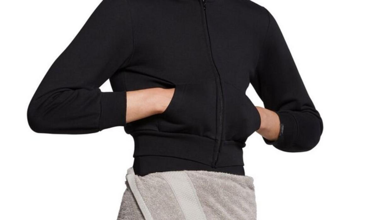 Model wearing Balenciaga's wrap-around towel skirt