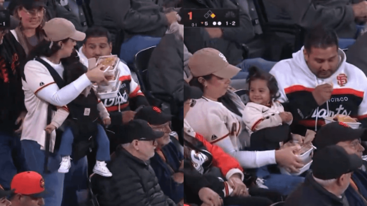 Mother, baby, and husband at San Francisco Giants game