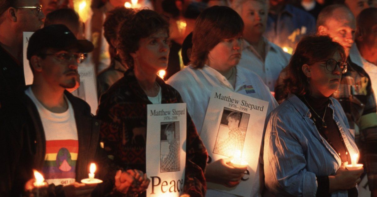 Mourners at a candlelight vigil for Matthew Shepard in 1998