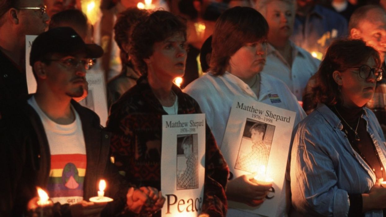 Mourners at a candlelight vigil for Matthew Shepard in 1998