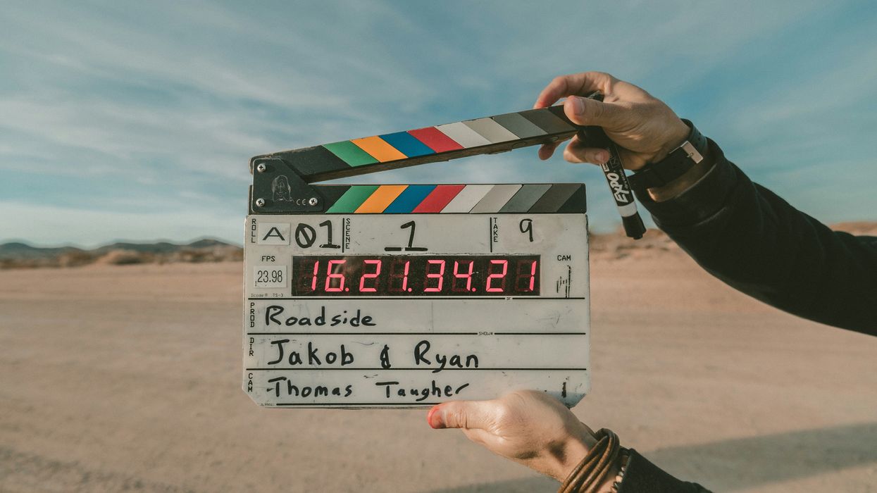 movie clapboard that says "Roadside" above "Jakob & Ryan"