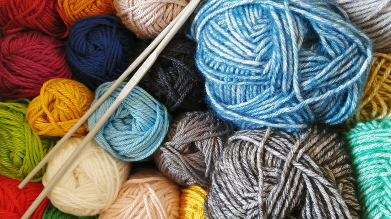 multiple skeins of yarn in a variety of colors
