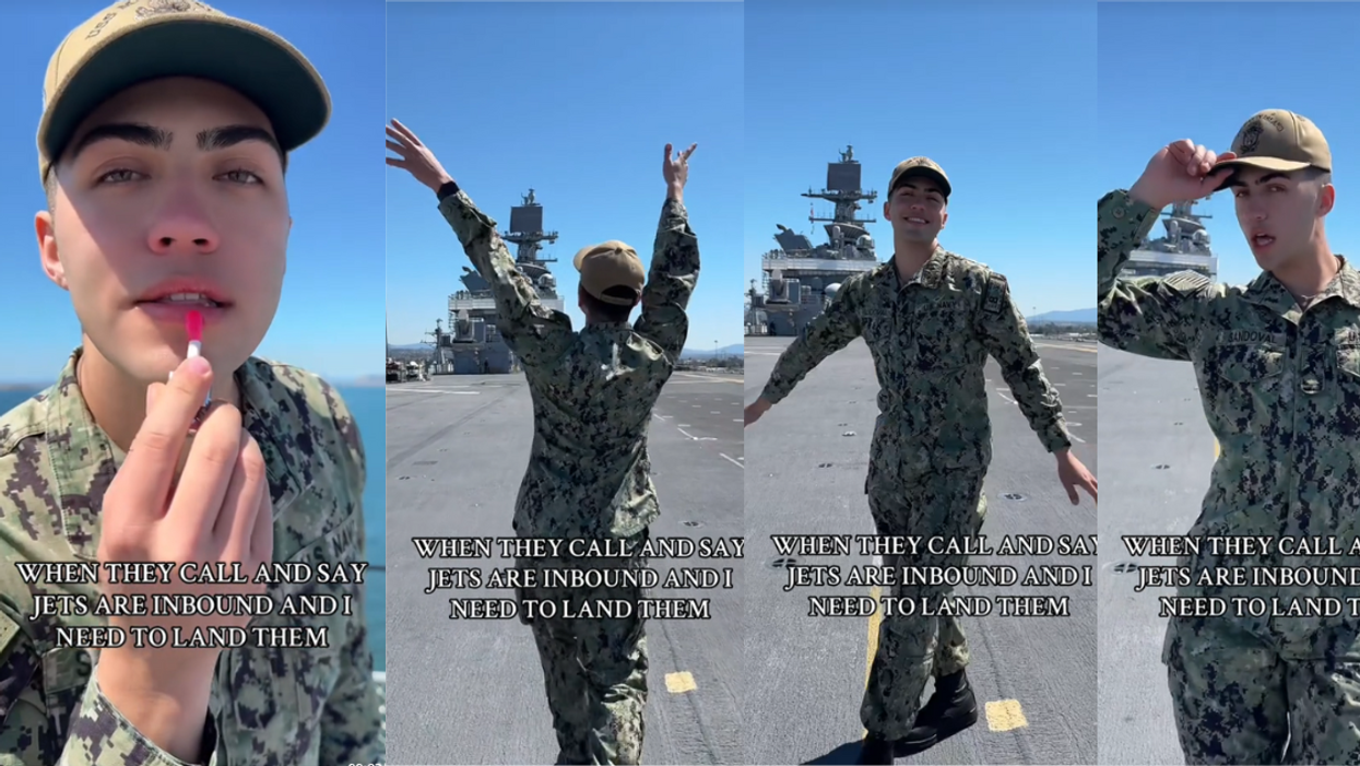 Navy Airman catwalks while landing jets