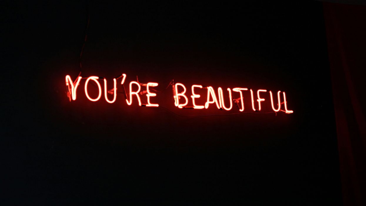 Neon sign that reads, "You're Beautiful"