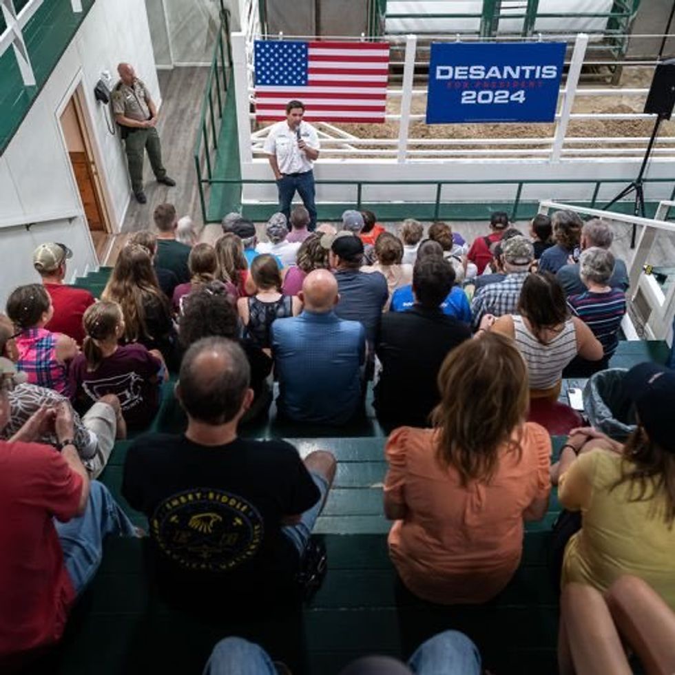 Never Back Down PAC manipulated photo of DeSantis rally