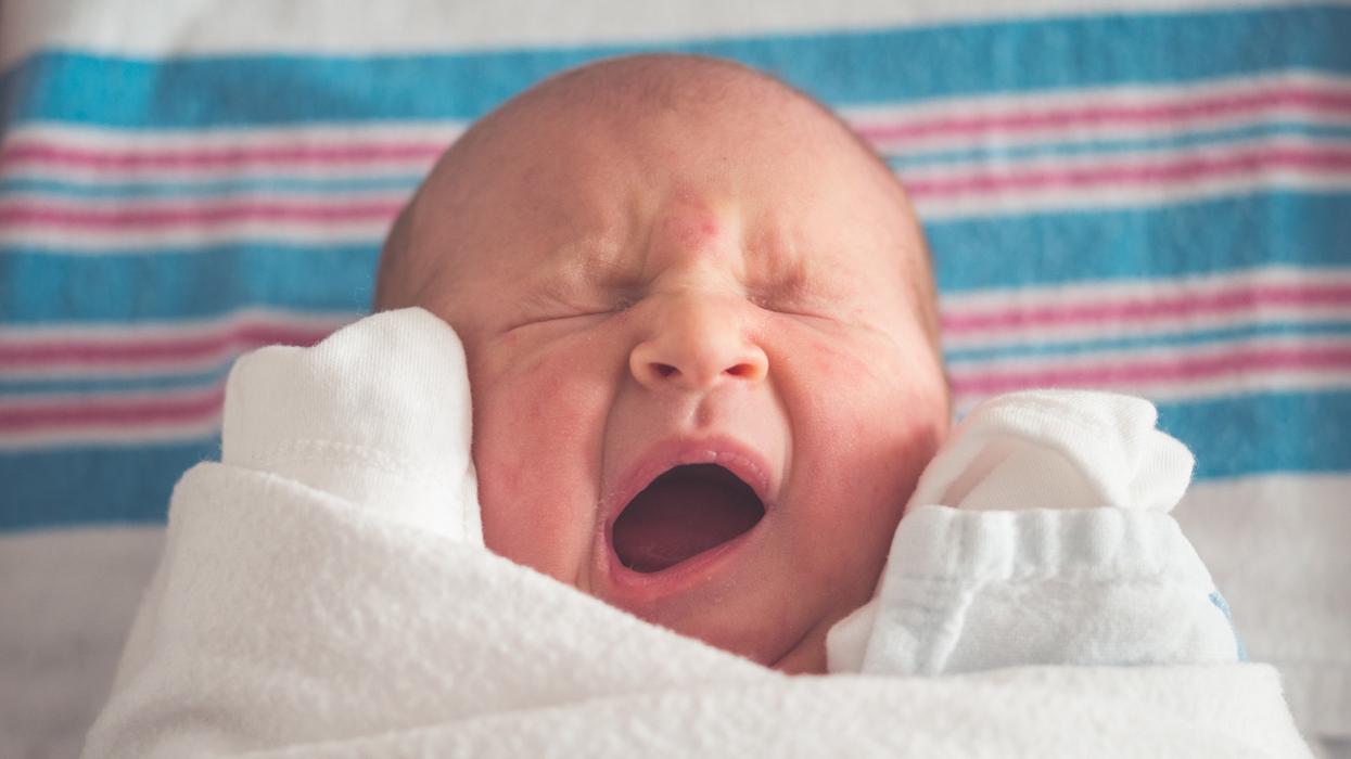 Newborn baby crying (perhaps over their interesting name)