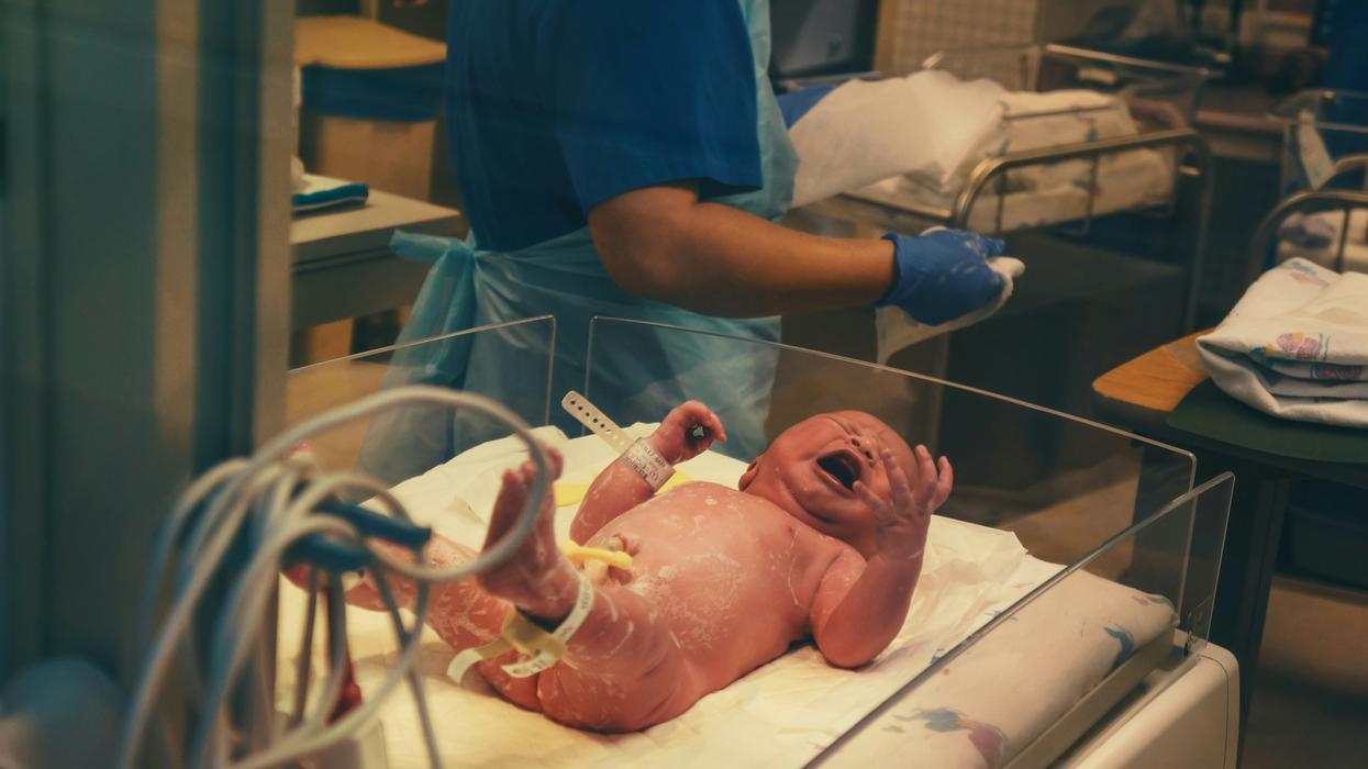 newborn baby in delivery room