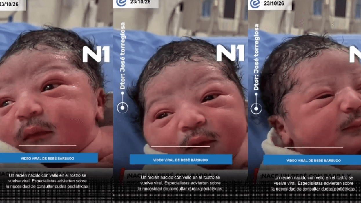 Newborn baby with full mustache