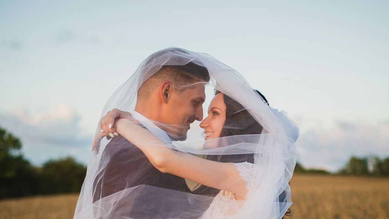 Newly married couple posing during a photoshoot