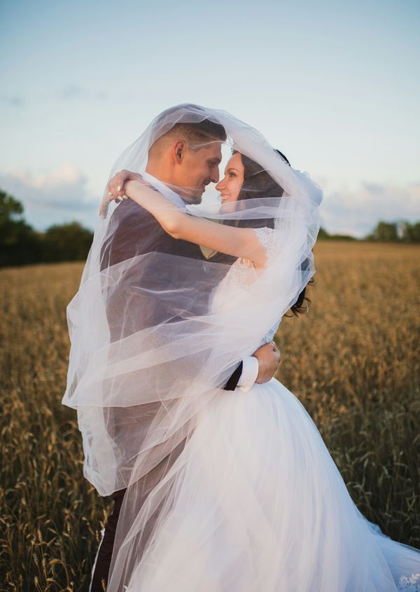 Newly married couple posing during a photoshoot