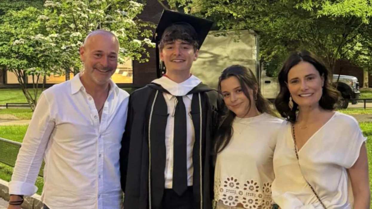 Noah Schnapp poses with his family after graduating from the University of Pennsylvania's Wharton School of Business.