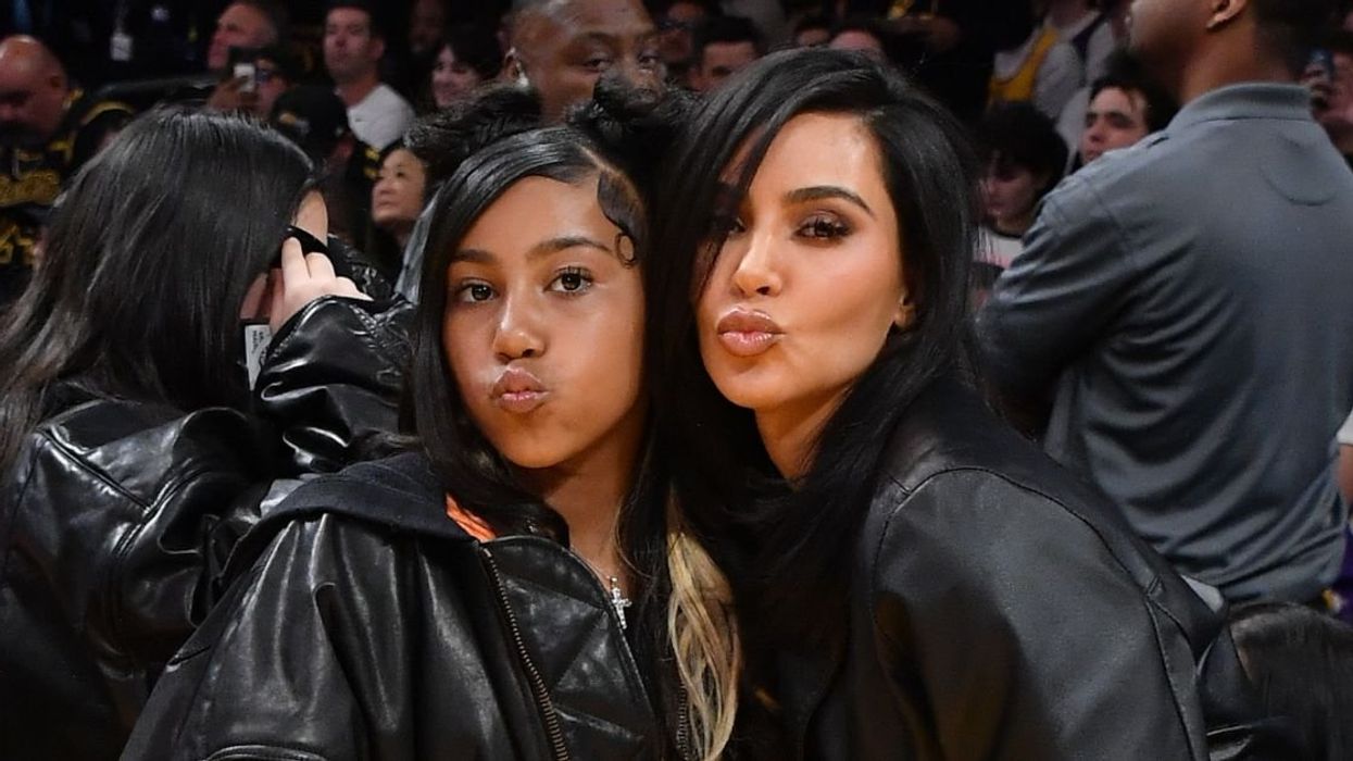 North West (L) with mom Kim Kardashian (R)