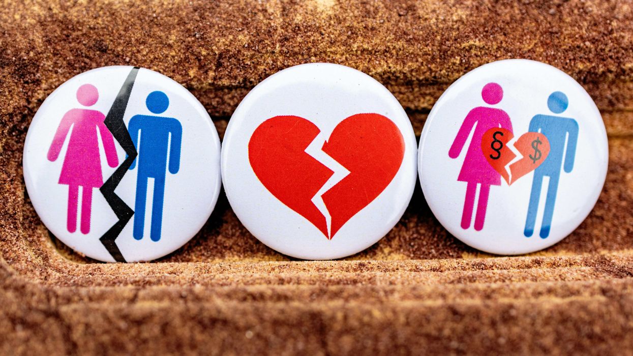 One button with a line between a man and a woman, one button with a broken heart, and a third button with a broken heart and a man and a woman