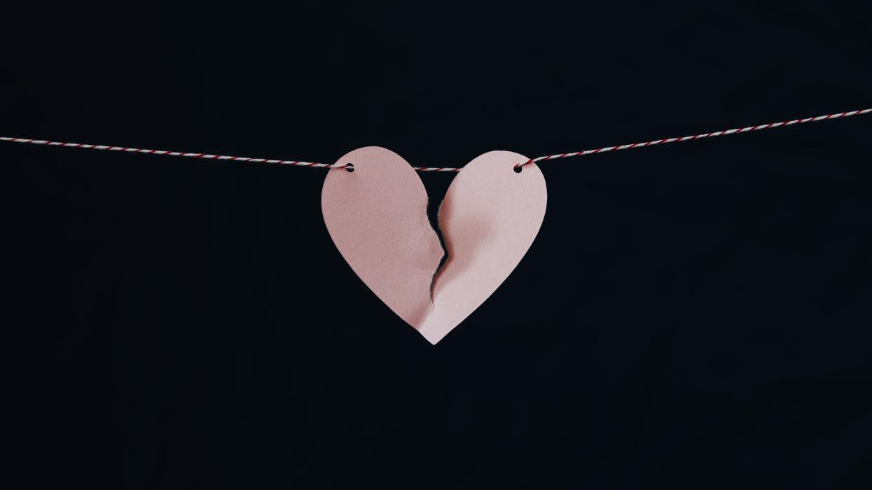 Paper heart ripped in half